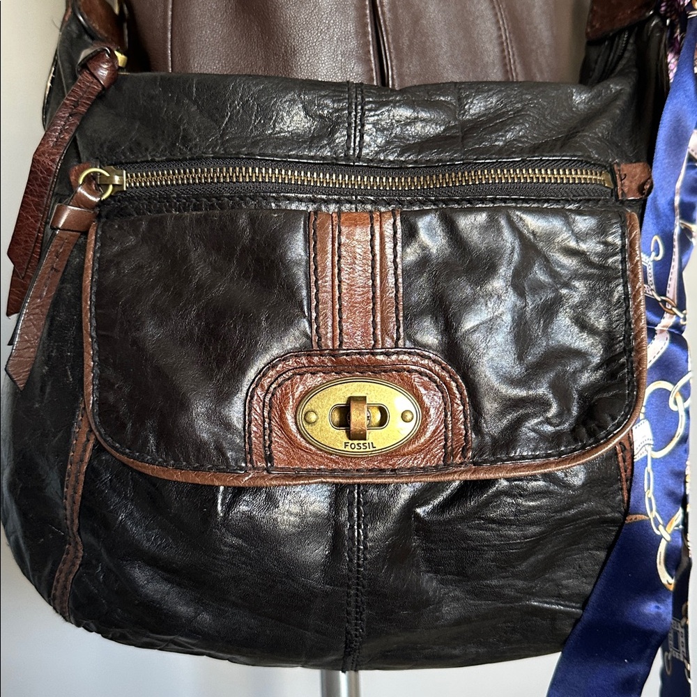 Fossil EUC black leather shoulder/crossbody w/ brown trim. Nylon/leather straps